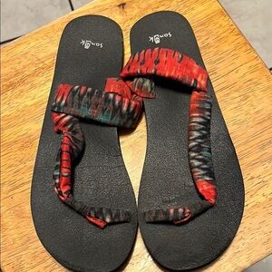 Sanuk Black and Red Sandals with Intricate Woven Straps